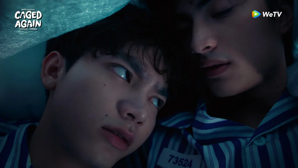 A scene in episode 3 of Caged again where Junior and Sun is hiding under duvet from others
