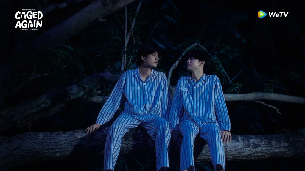 A still of episode 3 of Caged again where Junior and Sun sitting and chatting together